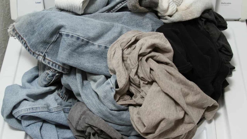 The Baggy Pants and Shirt Weren't Hiding Me: What I Learned About Choosing Gym Clothes at 270 Pounds baggy clothing piles up on the laundry to wash